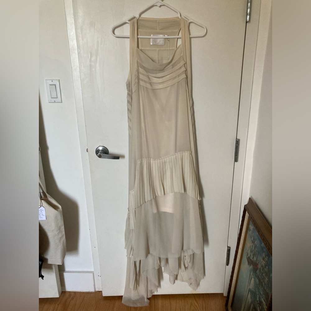 Asymmetric pleated sleeveless dress